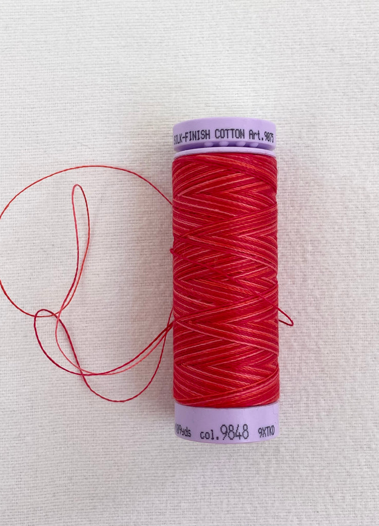 Scarlet/ Coral Variegated Mettler Thread 9848- 100m