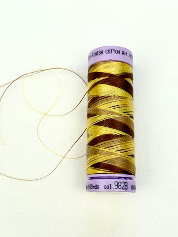 Small Yellow / Brown Variegated Mettler Thread 9828 - 100m