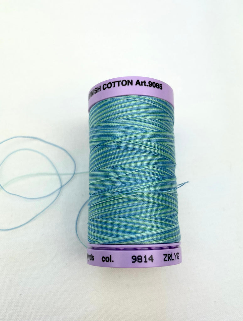 Large Turquoise Variegated Mettler Thread 9814- 457m